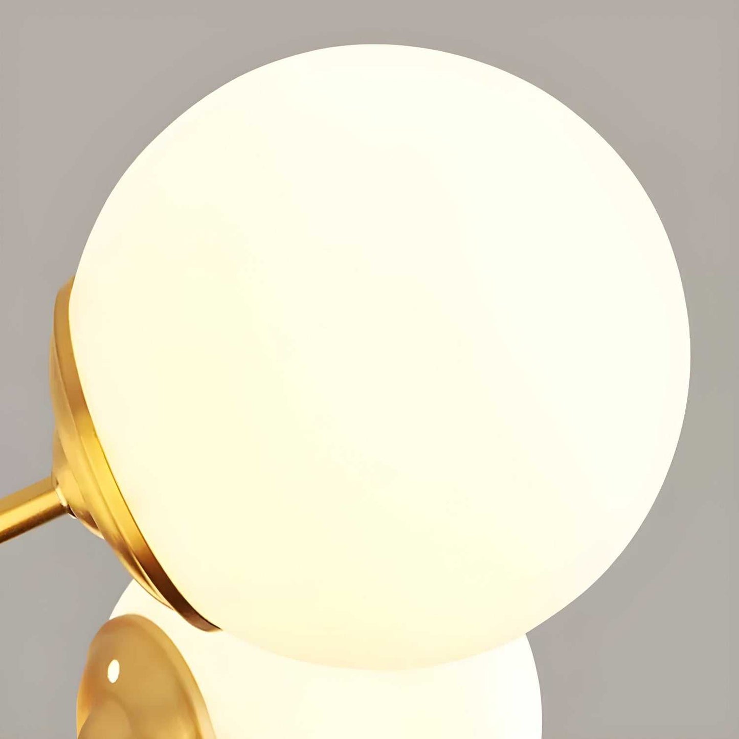 8-light globe pendant light with Sputnik design in a modern dining room setting - orangme.com