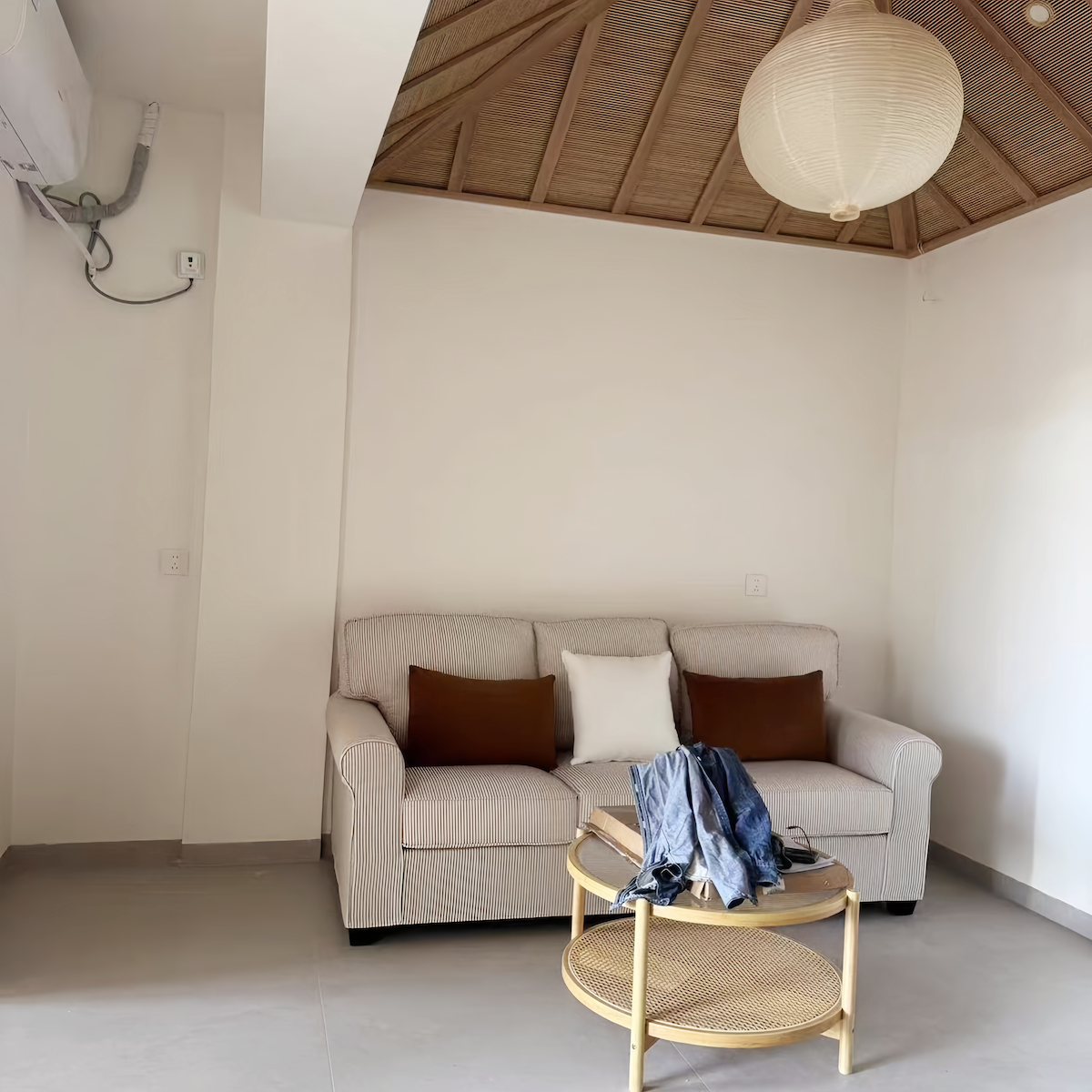 Three-seater fabric sofa with American and Mediterranean minimalist design, soft cushions, washable cover, and sturdy wooden frame