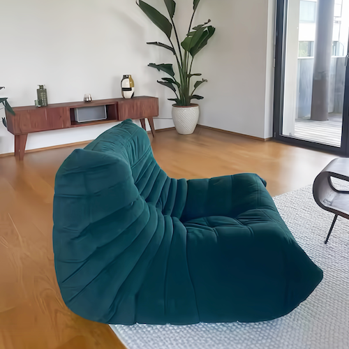 Togo Chair in modern living room, showcasing minimalist design and premium materials.