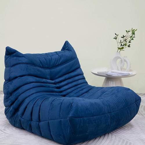 Togo Chair in blue suede velvet, minimalist modern armchair, perfect for living room comfort and style.