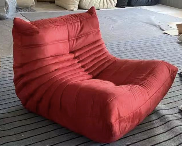 Red Togo Chair with modern design and high-density foam for comfort - orangme.com