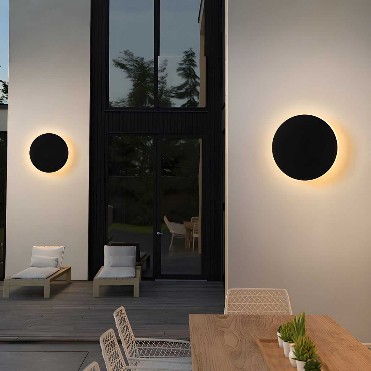 Modern style round LED outdoor wall lighting in sleek black and white design on building exterior - orangme.com