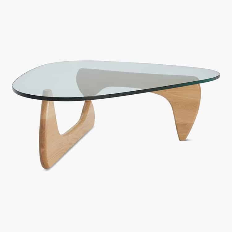 Noguchi Coffee Table with interlocking wood base and glass top.