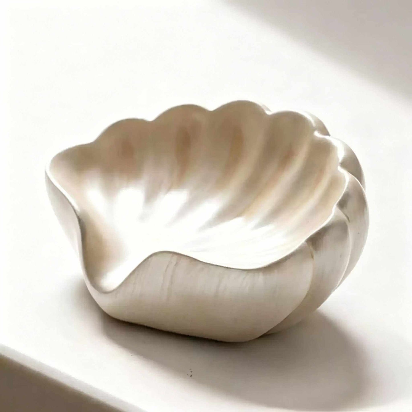 Nordic minimalist painted ceramic soap dish with built-in draining design on bathroom countertop