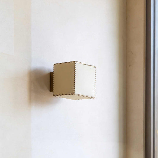 Gold door handle on a white door