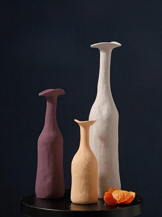 Morandi Creative Ceramic Vase in muted tones with sleek straight-neck minimalist design on wooden table