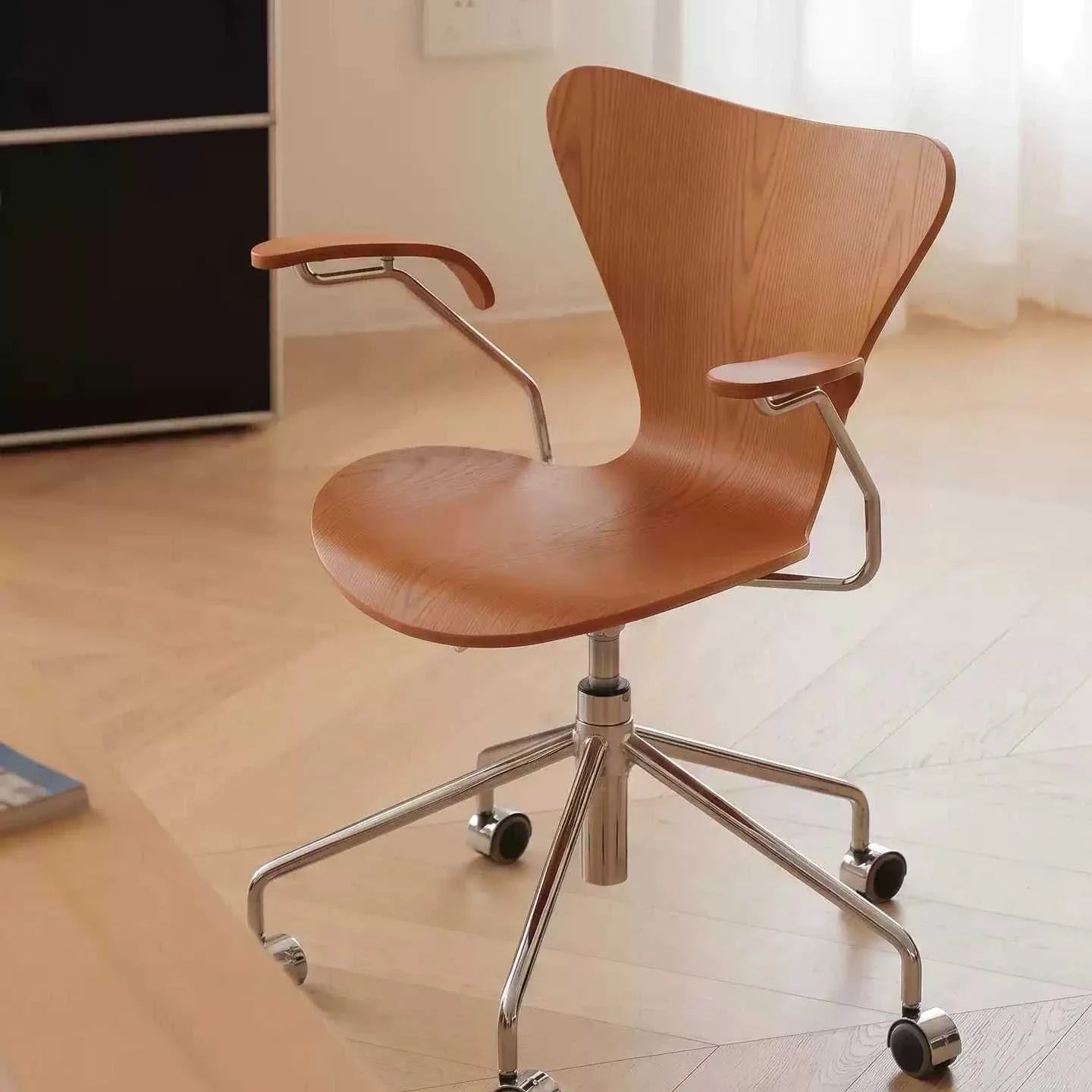 Nordic Mid-Century vintage Bauhaus office chair with ash wood veneer and chrome steel base, adjustable height and swivel.
