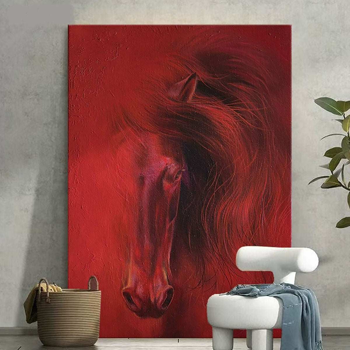 Red horse painting on a wall with a white stool and plant in the foreground.