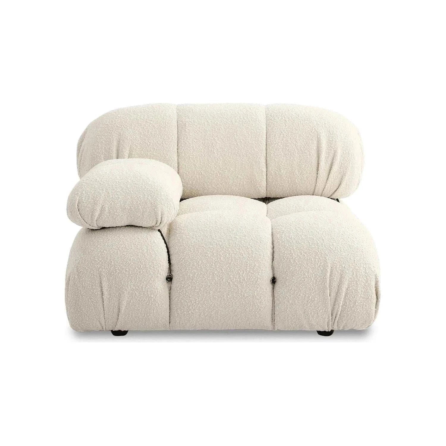 Modern sectional sofa with flexible fabric modules in white velvet.