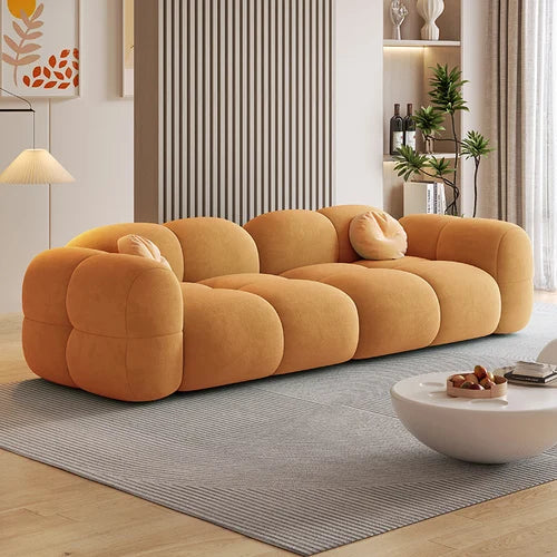 orange four seater sofa