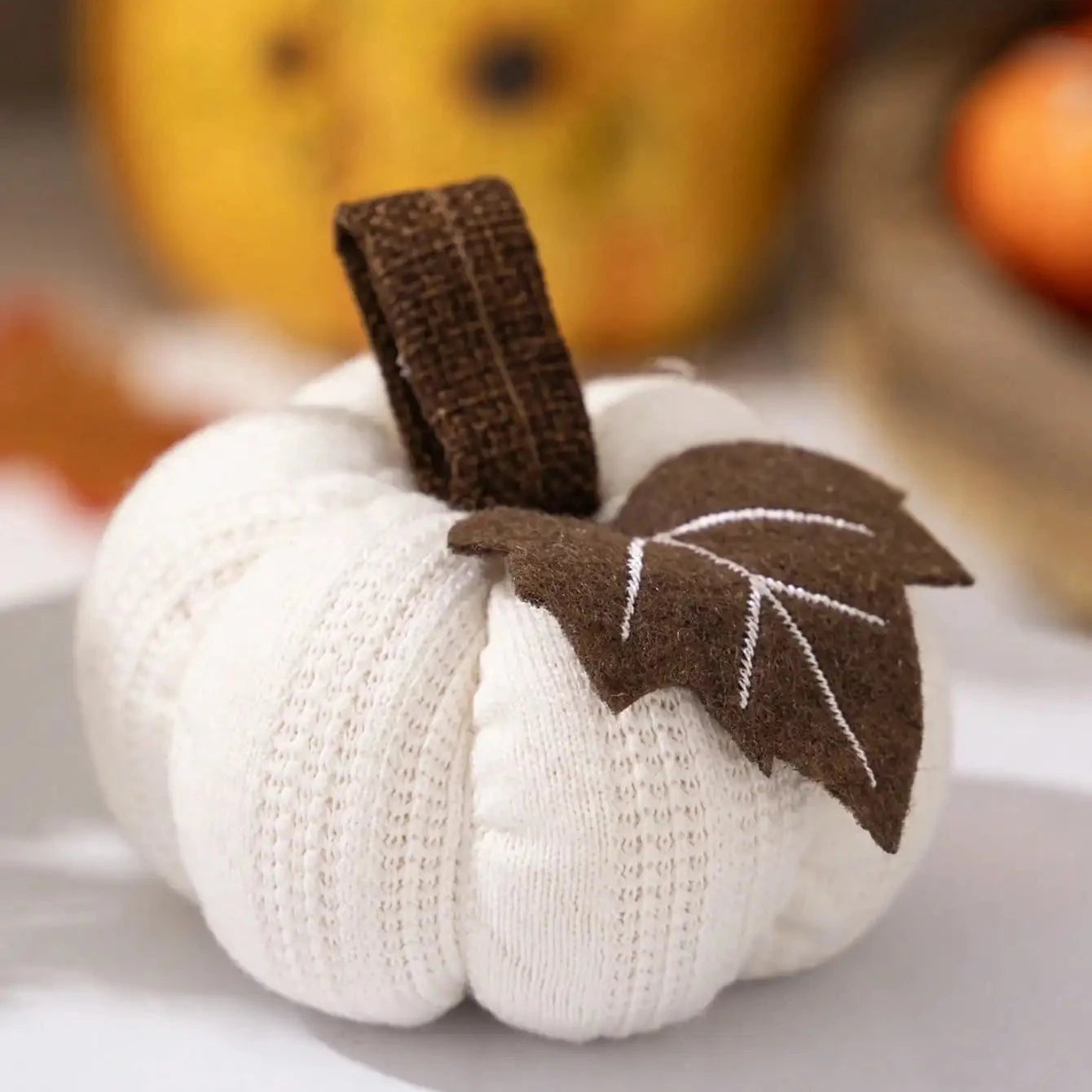 white knitted pumpkin