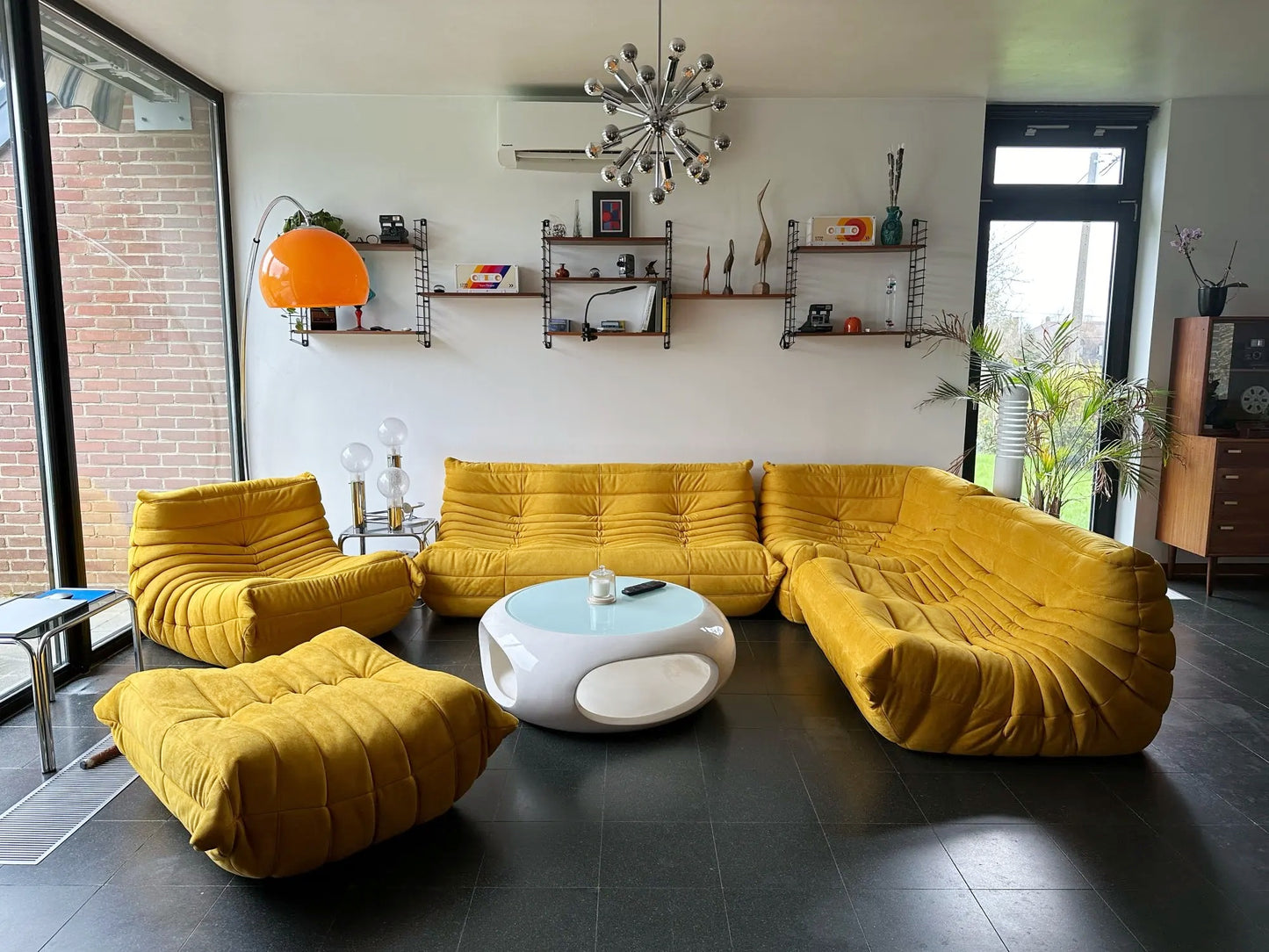 Chic Togo Sofa in ginger suede in a modern living room setting - orangme.com